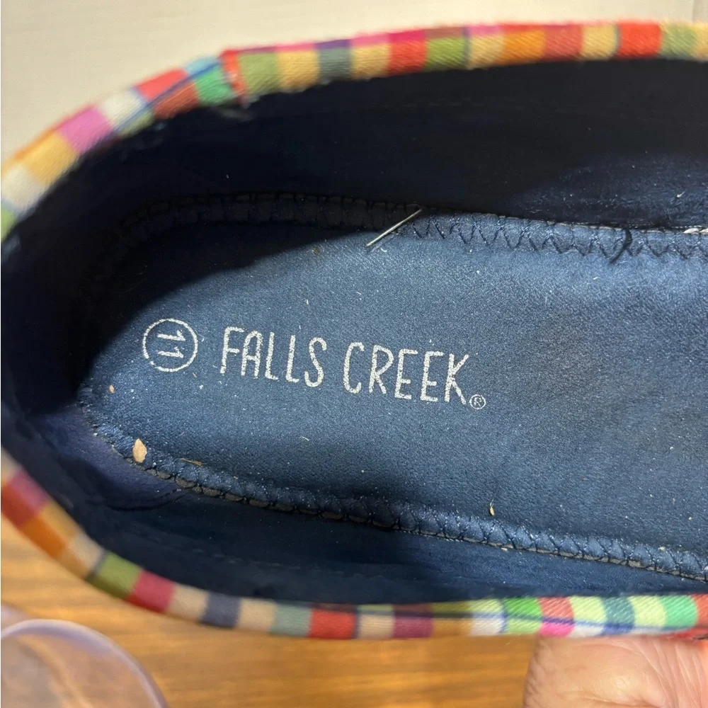 Falls Creek women’s 11 boat or deck shoes. Leather laces navy w/red & white trim